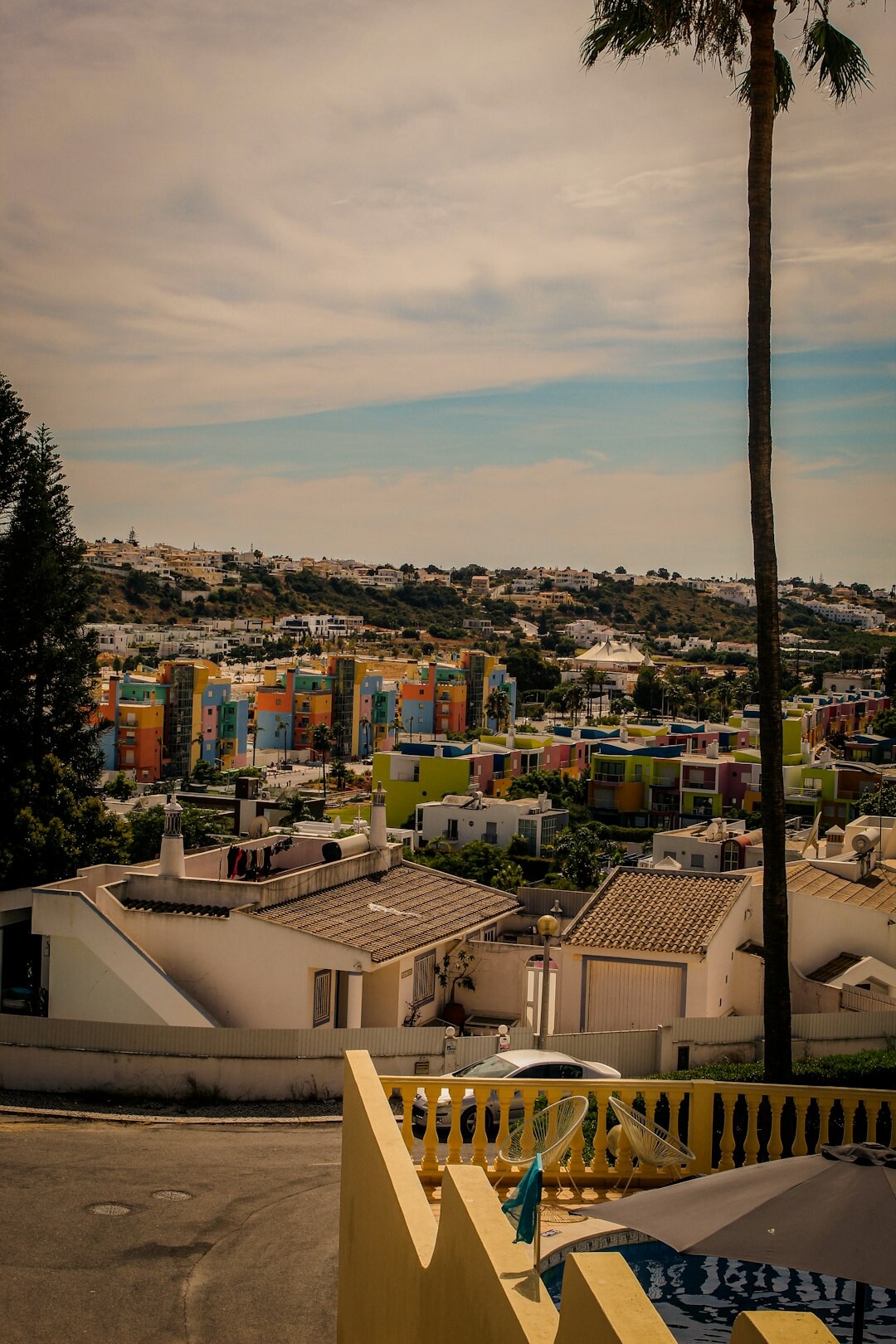 Rows of colorful popular housing on a hillside neighborhood