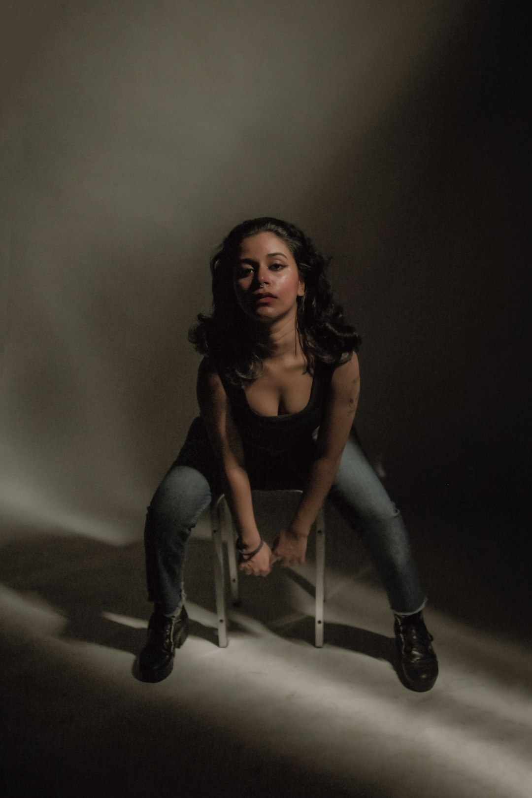 Studio portrait of a Latina woman photographer